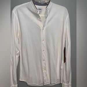 Men’s long sleeve Button up shirt.